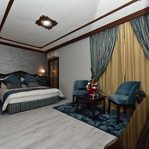 Kamer met een Queen Size Bed